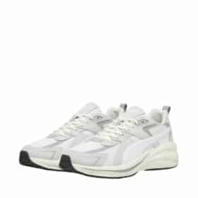 Puma unisex sneakers i hvid. Lækker moderne sneakers med flotte beige og grå detaljer. Stødbasorberende sål.