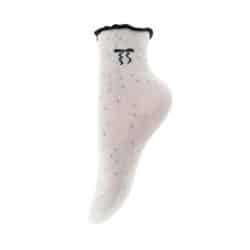 By Stær strømper til dame i råhvid med fine prikkede hjerter i forskellige farver samt sort flæser