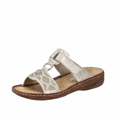 Rieker sandal til dame i guld med flotte detaljer og velcrorem samt stødabsorberende sål