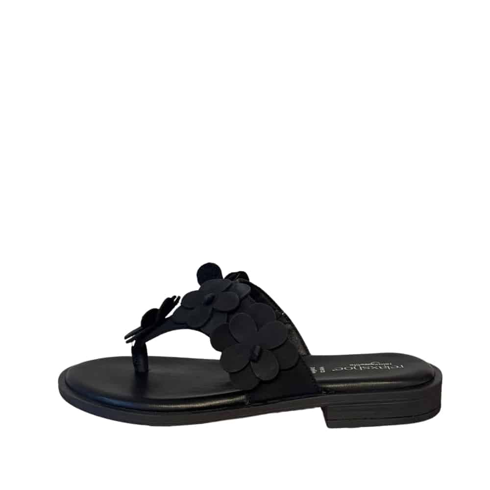 Relaxshoe sandal til dame i sort skind og med blomsterdetaljer.